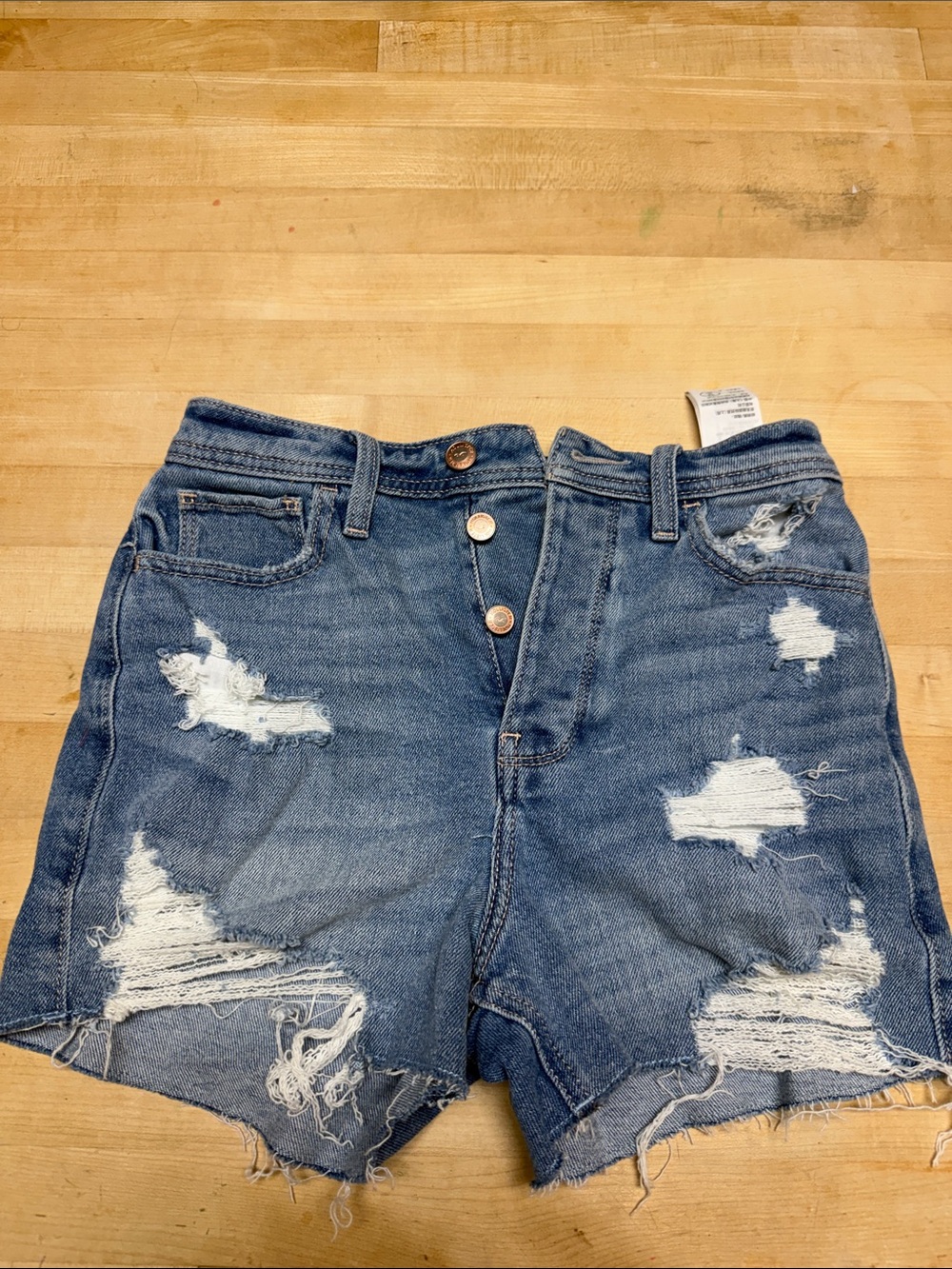 Hollister Distressed High-Waist Denim Shorts in Medium Blue